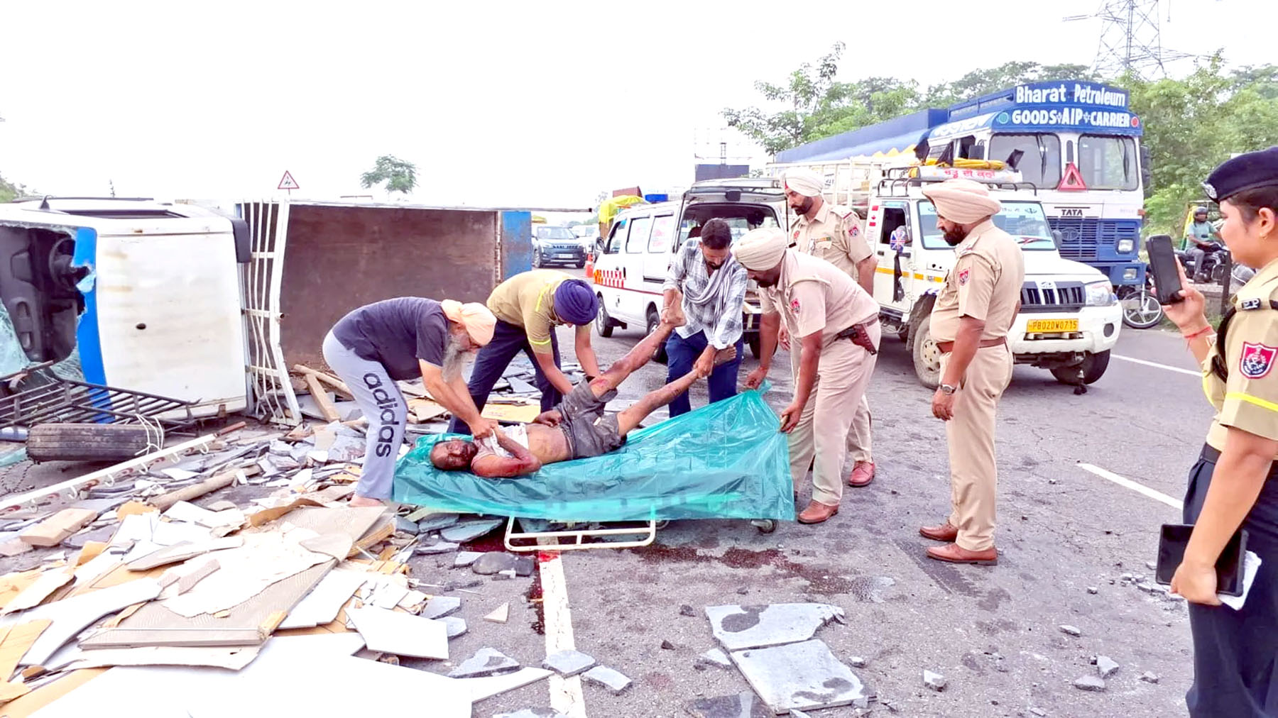 Pickup van loaded with marble and tiles overturns near Phillaur, three dead.